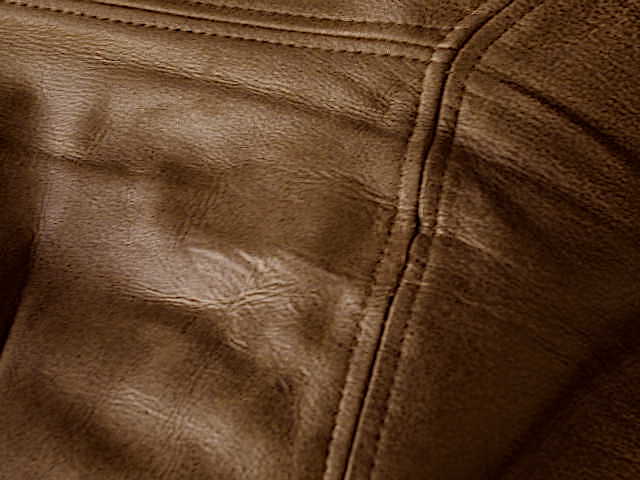Massive Hole in Leather Cushion Repaired
